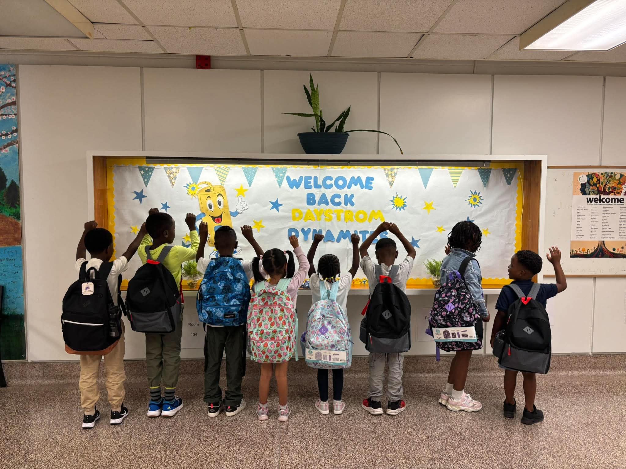 Students with donated backpacks