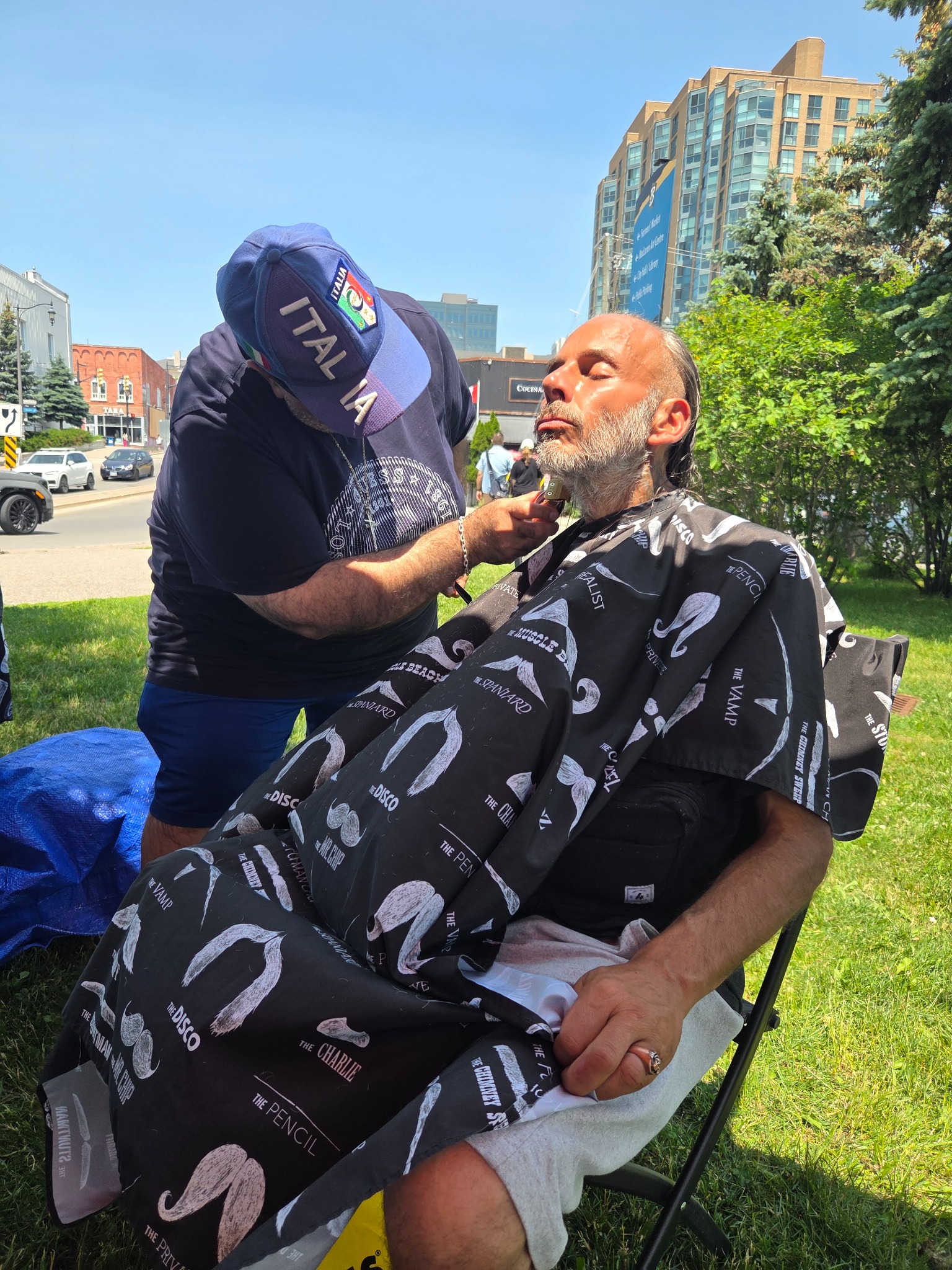 Volunteer providing a haircut