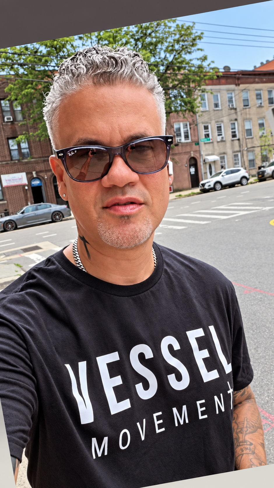 Michael wearing a black Vessel Movement T-shirt