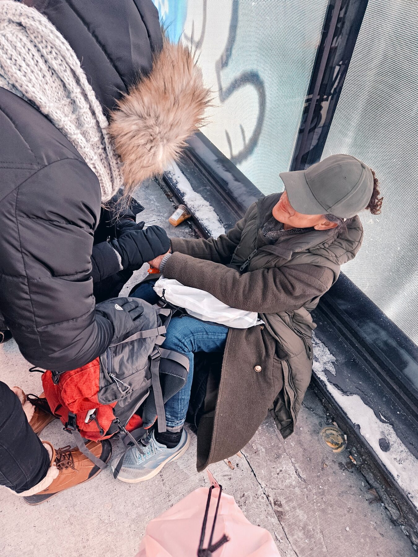 A volunteer connecting with someone during winter outreach